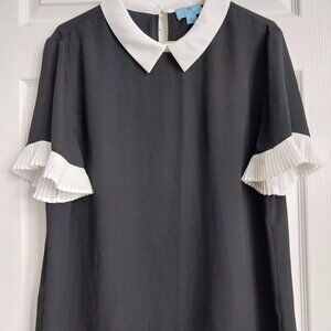 A CeCe black and white blouse